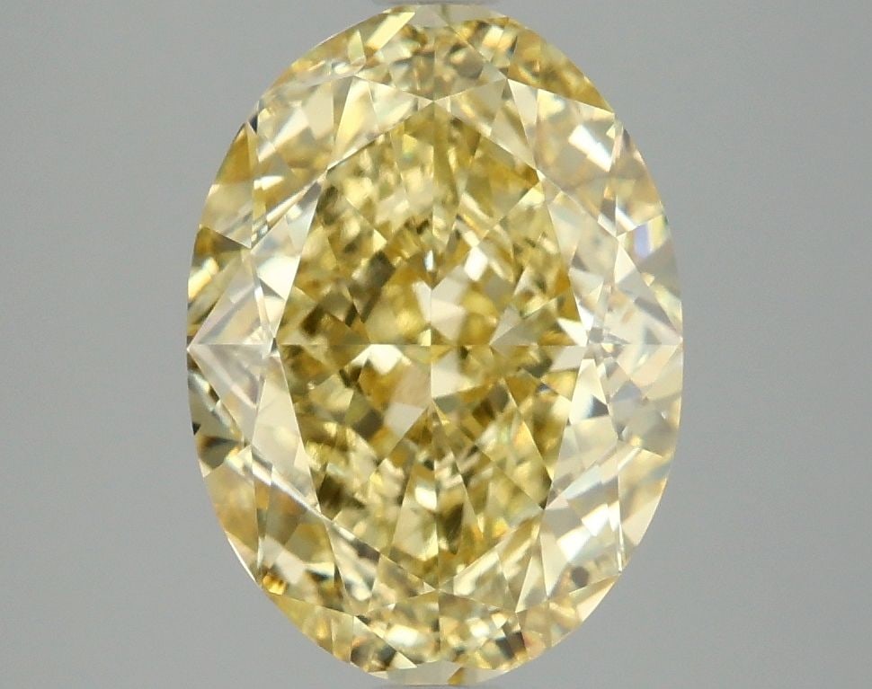 Loose Diamond - OVAL 4.07ct Fancy Vivid Yellow VS1: Loose Diamond - OVAL 4.07ct Fancy Vivid Yellow VS1 Source: This is a real non-mined Diamond that has been grown in a lab Shape: OVAL Carats: 4.07 Color: Fancy Vivid Yellow Certification: IGI Video: