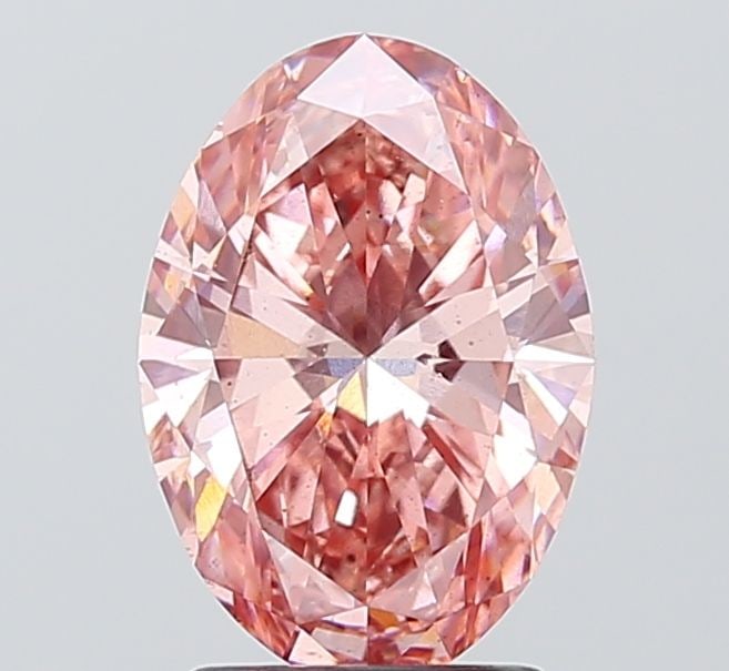 Loose Diamond - OVAL 2.0ct Fancy Vivid Pink SI1: Loose Diamond - OVAL 2.0ct Fancy Vivid Pink SI1 Source: This is a real non-mined Diamond that has been grown in a lab Shape: OVAL Carats: 2.0 Color: Fancy Vivid Pink Certification: IGI Video: