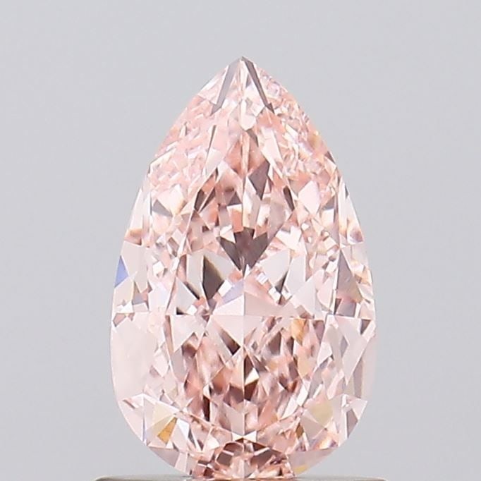 Loose Diamond - PEAR 1.03ct Fancy Intense Pink VVS2: Loose Diamond - PEAR 1.03ct Fancy Intense Pink VVS2 Source: This is a real non-mined Diamond that has been grown in a lab Shape: PEAR Carats: 1.03 Color: Fancy Intense Pink Certification: IGI The Diam