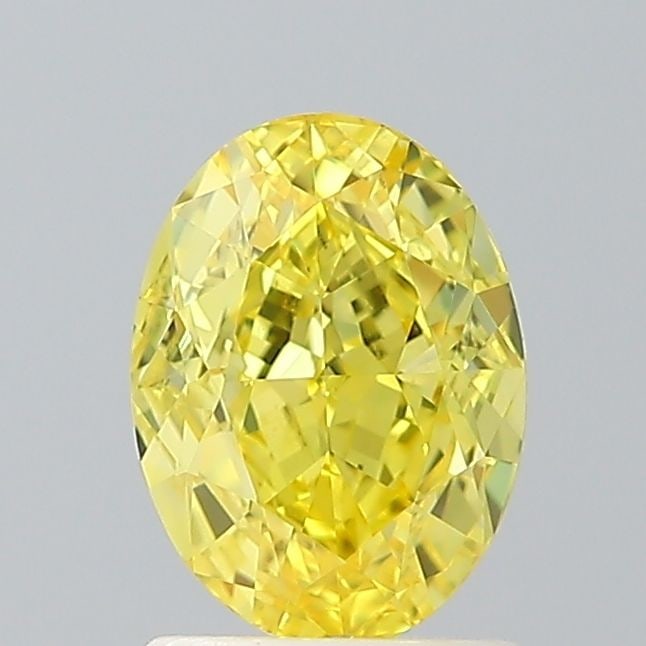 Loose Diamond - OVAL 1.52ct Fancy Vivid Yellow VS2: Loose Diamond - OVAL 1.52ct Fancy Vivid Yellow VS2 Source: This is a real non-mined Diamond that has been grown in a lab Shape: OVAL Carats: 1.52 Color: Fancy Vivid Yellow Certification: IGI Video:
