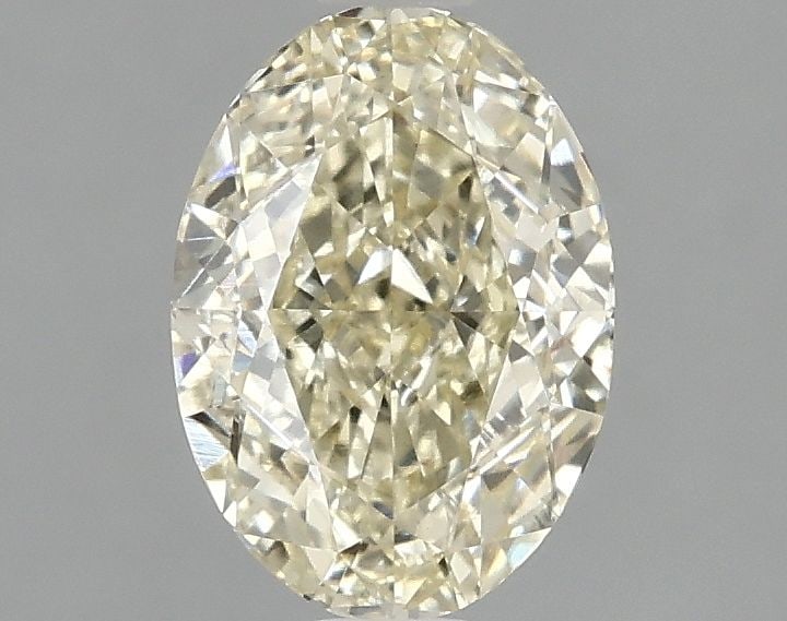 Loose Diamond - OVAL 1.59ct Fancy Yellow VVS2: Loose Diamond - OVAL 1.59ct Fancy Yellow VVS2 Source: This is a real non-mined Diamond that has been grown in a lab Shape: OVAL Carats: 1.59 Color: Fancy Yellow Certification: IGI Video: