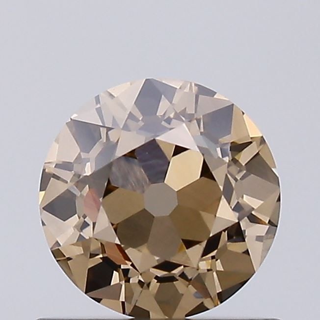 Loose Diamond - OLD EUROPEAN CUT 0.63ct Fancy Light Brown VVS2: Loose Diamond - OLD EUROPEAN CUT 0.63ct Fancy Light Brown VVS2 Source: This is a real non-mined Diamond that has been grown in a lab Shape: OLD EUROPEAN CUT Carats: 0.63 Color: Fancy Light Brown Certi