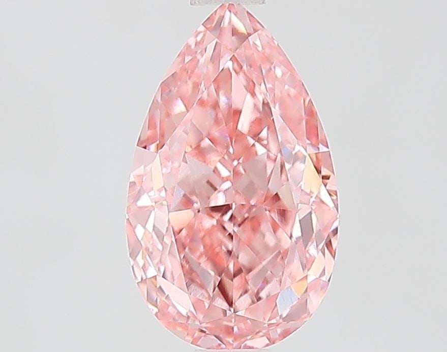 Loose Diamond - PEAR 2.07ct Fancy Vivid Pink VVS2: Loose Diamond - PEAR 2.07ct Fancy Vivid Pink VVS2 Source: This is a real non-mined Diamond that has been grown in a lab Shape: PEAR Carats: 2.07 Color: Fancy Vivid Pink Certification: IGI Video: