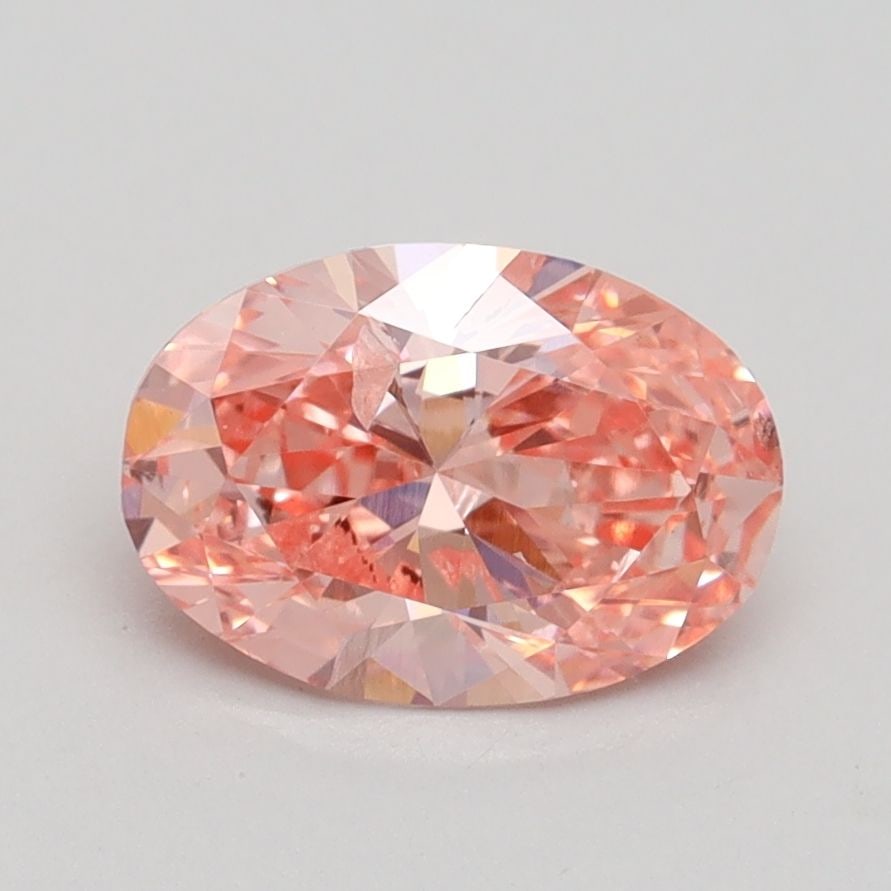 Loose Diamond - OVAL 1.4ct Fancy Vivid Pink SI2: Loose Diamond - OVAL 1.4ct Fancy Vivid Pink SI2 Source: This is a real non-mined Diamond that has been grown in a lab Shape: OVAL Carats: 1.4 Color: Fancy Vivid Pink Certification: IGI Video: