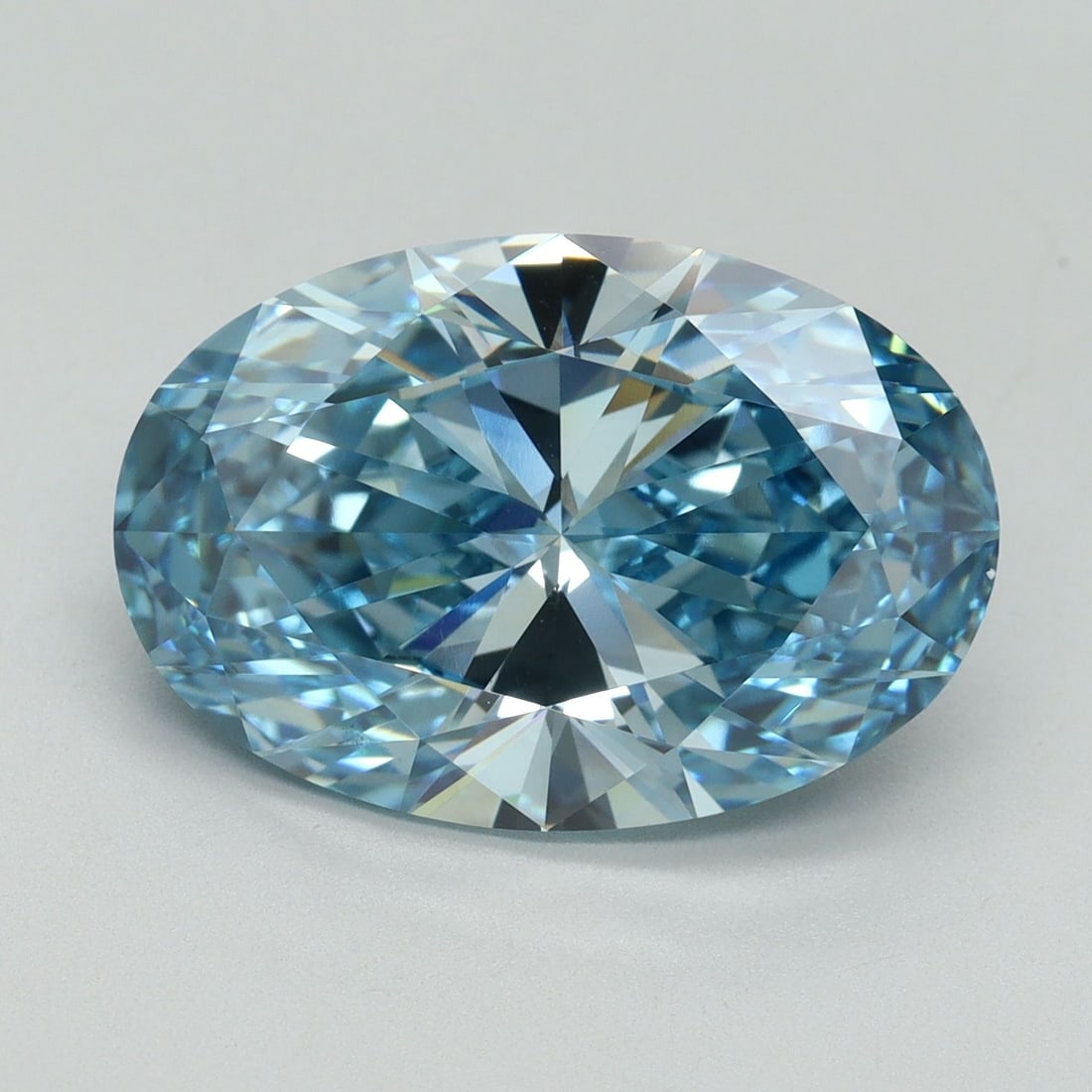 Loose Diamond - OVAL 7.04ct Fancy Vivid Blue VS1: Loose Diamond - OVAL 7.04ct Fancy Vivid Blue VS1 Source: This is a real non-mined Diamond that has been grown in a lab Shape: OVAL Carats: 7.04 Color: Fancy Vivid Blue Certification: IGI Video: