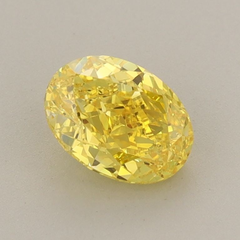 Loose Diamond - OVAL 1.06ct Fancy Vivid Yellow VVS2: Loose Diamond - OVAL 1.06ct Fancy Vivid Yellow VVS2 Source: This is a real non-mined Diamond that has been grown in a lab Shape: OVAL Carats: 1.06 Color: Fancy Vivid Yellow Certification: IGI The Diam