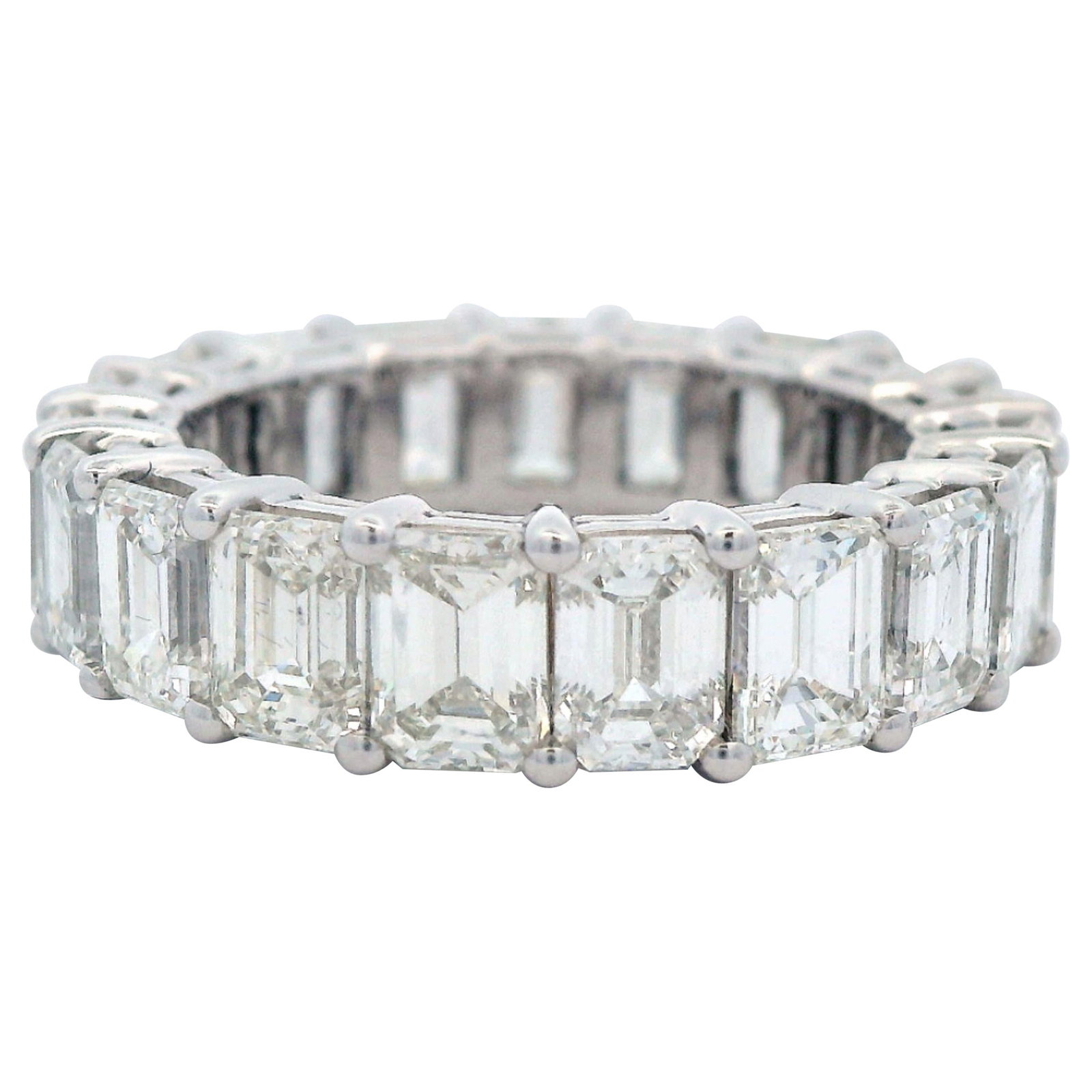 18k White Gold Eternity Band 7.55ct Emerald Cut Diamond: 18k White Gold Eternity Band 7.55ct Emerald Cut Diamond Un-used contemporary eternity band set with 19 emerald cut white diamonds totaling 7.55 ct. The diamonds are approximately F color and VVS1 clar