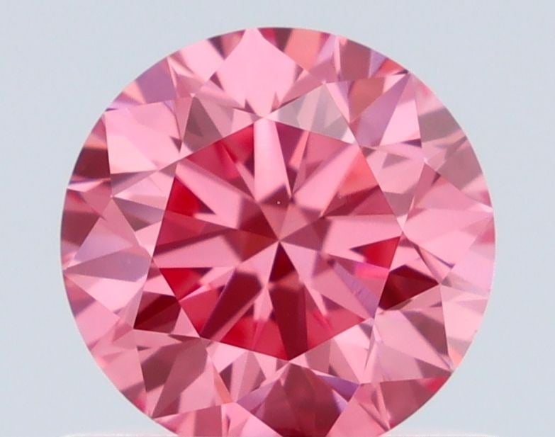 Loose Diamond - ROUND 0.64ct Fancy Vivid Pink VS2: Loose Diamond - ROUND 0.64ct Fancy Vivid Pink VS2 Source: Natural Shape: ROUND Carats: 0.64 Color: Fancy Vivid Pink Certification: GIA Video: