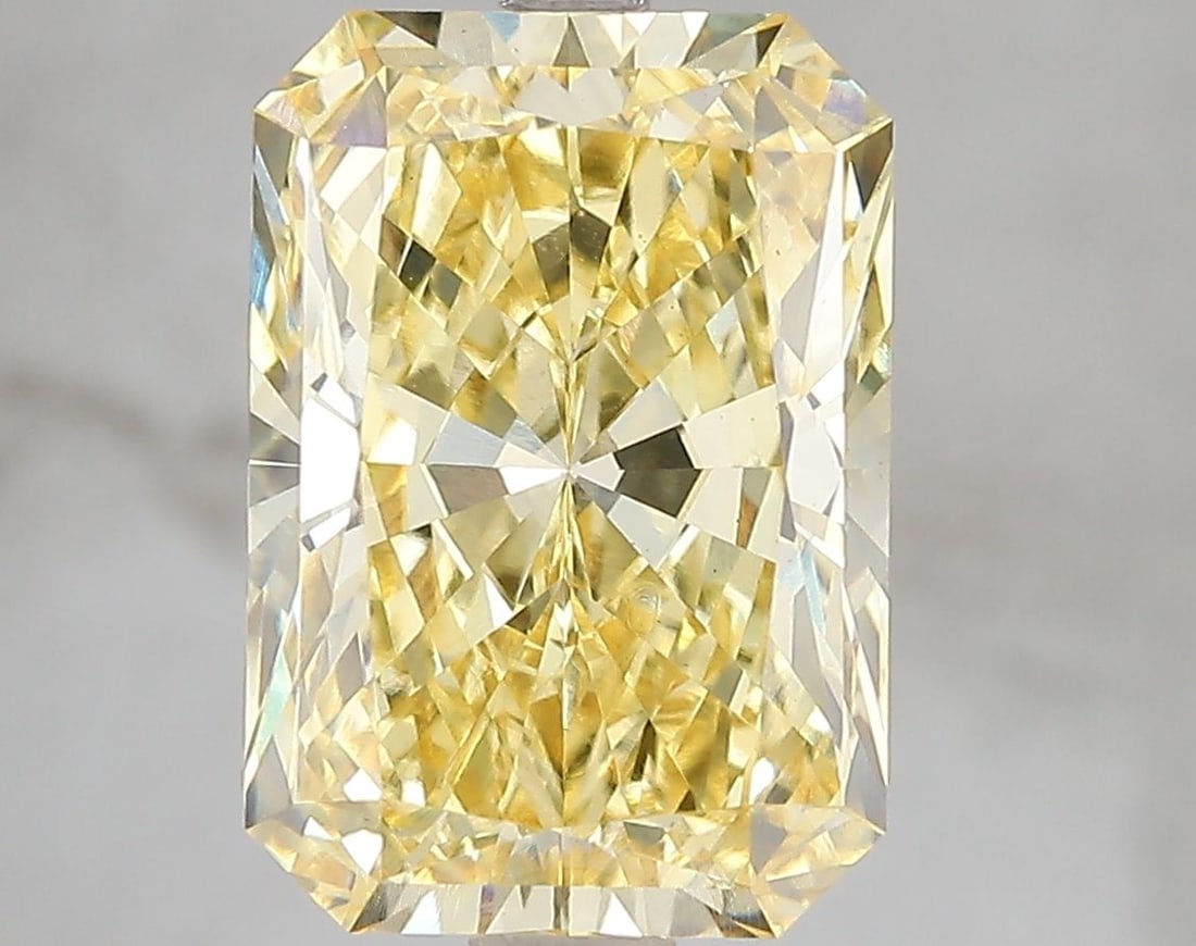 Loose Diamond - RADIANT 5.1ct Fancy Vivid Yellow VS1: Loose Diamond - RADIANT 5.1ct Fancy Vivid Yellow VS1 Source: This is a real non-mined Diamond that has been grown in a lab Shape: RADIANT Carats: 5.1 Color: Fancy Vivid Yellow Certification: IGI Video