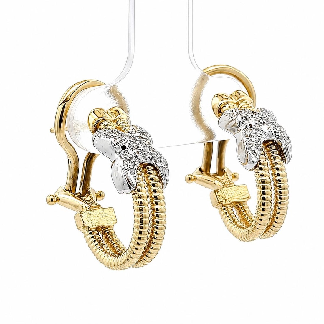 14k Gold Diamond Hoop Earrings Twisted Cable X Motif Omega Back: 14k Gold Diamond Hoop Earrings Twisted Cable X Motif Omega Back Pre-owned hoop earrings in a twisted cable cuff omega design with an "X" shape accent. Crafted in solid 14k yellow and white gold, they 