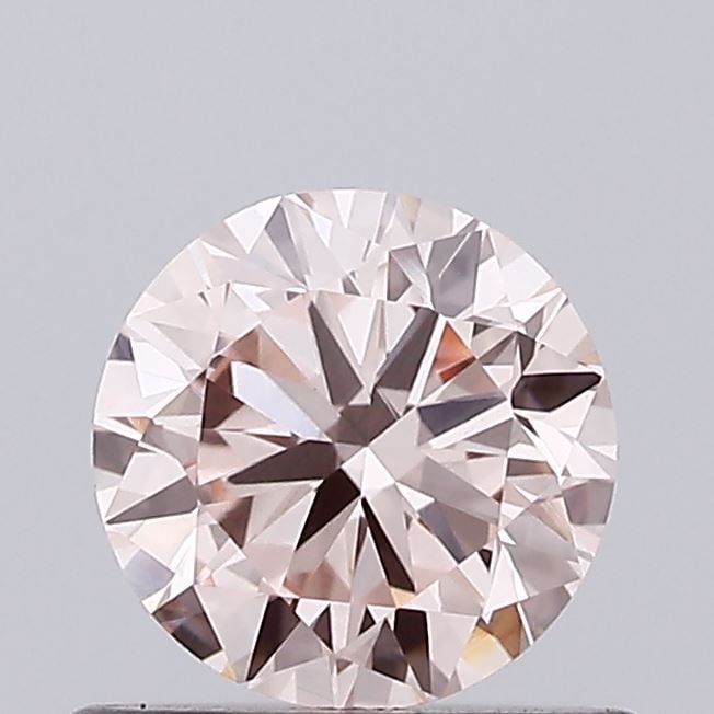 Loose Diamond - ROUND 0.65ct Fancy Pink VVS2: Loose Diamond - ROUND 0.65ct Fancy Pink VVS2 Source: This is a real non-mined Diamond that has been grown in a lab Shape: ROUND Carats: 0.65 Color: Fancy Pink Certification: IGI Video: