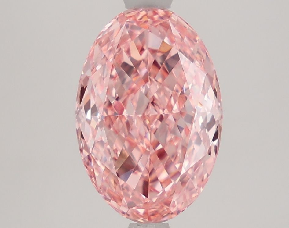 Loose Diamond - OVAL 2.59ct Fancy Vivid Pink VVS2: Loose Diamond - OVAL 2.59ct Fancy Vivid Pink VVS2 Source: This is a real non-mined Diamond that has been grown in a lab Shape: OVAL Carats: 2.59 Color: Fancy Vivid Pink Certification: IGI Video: