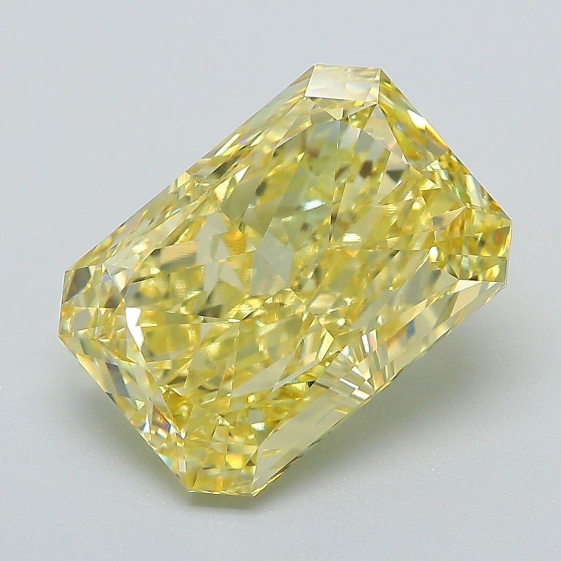 Loose Diamond - RADIANT 6.01ct Fancy Vivid Yellow VS1: Loose Diamond - RADIANT 6.01ct Fancy Vivid Yellow VS1 Source: This is a real non-mined Diamond that has been grown in a lab Shape: RADIANT Carats: 6.01 Color: Fancy Vivid Yellow Certification: IGI Vid