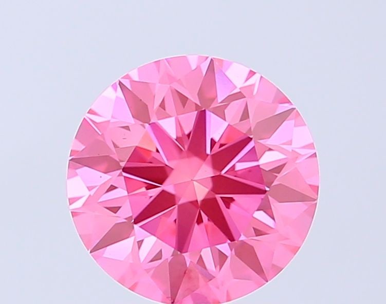 Ideal Loose Diamond - ROUND 1.5ct Fancy Vivid Pink VS1: Ideal Loose Diamond - ROUND 1.5ct Fancy Vivid Pink VS1 Source: This is a real non-mined Diamond that has been grown in a lab Shape: ROUND Carats: 1.5 Color: Fancy Vivid Pink Certification: IGI Video: