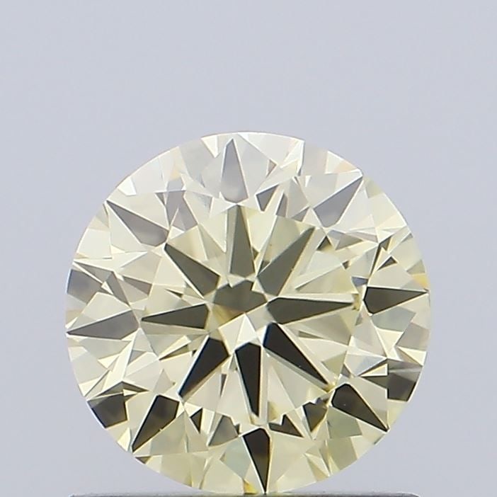 Loose Diamond - ROUND 0.9ct Fancy Light Yellow VVS2: Loose Diamond - ROUND 0.9ct Fancy Light Yellow VVS2 Source: This is a real non-mined Diamond that has been grown in a lab Shape: ROUND Carats: 0.9 Color: Fancy Light Yellow Certification: IGI Video: