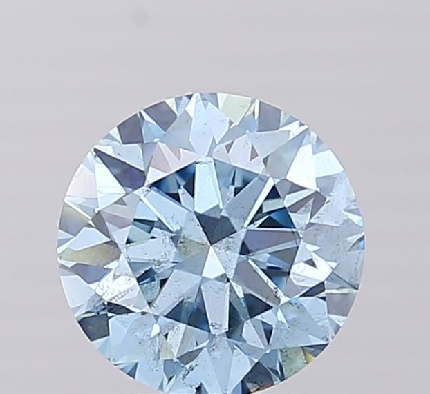 Ideal Loose Diamond - ROUND 0.65ct Fancy Vivid Pink VS1: Ideal Loose Diamond - ROUND 0.65ct Fancy Vivid Pink VS1 Source: This is a real non-mined Diamond that has been grown in a lab Shape: ROUND Carats: 0.65 Color: Fancy Vivid Pink Certification: IGI Video