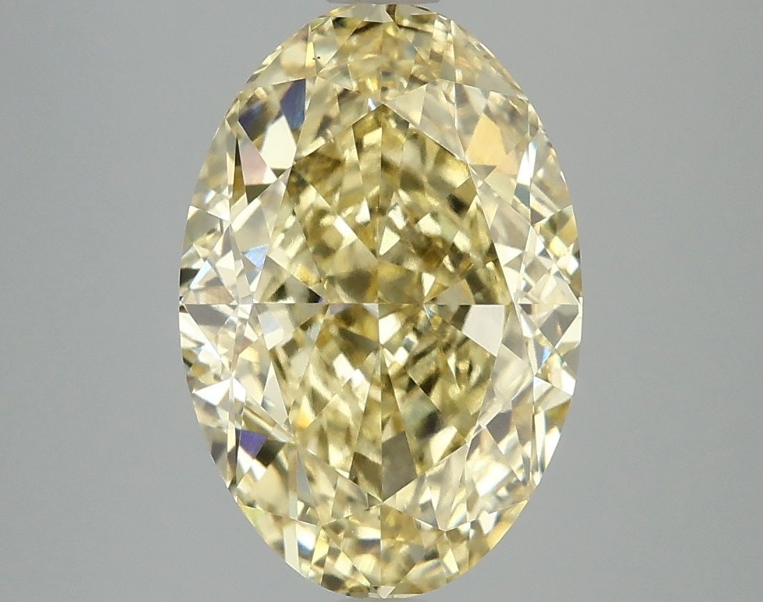 Loose Diamond - OVAL 5.04ct Fancy Vivid Yellow VS2: Loose Diamond - OVAL 5.04ct Fancy Vivid Yellow VS2 Source: This is a real non-mined Diamond that has been grown in a lab Shape: OVAL Carats: 5.04 Color: Fancy Vivid Yellow Certification: IGI Video: