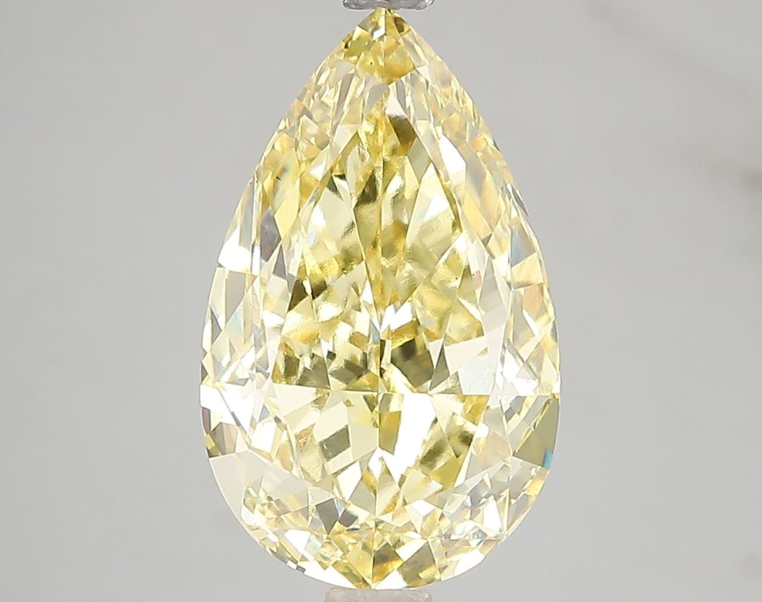 Loose Diamond - PEAR 5.01ct Fancy Vivid Yellow VS1: Loose Diamond - PEAR 5.01ct Fancy Vivid Yellow VS1 Source: This is a real non-mined Diamond that has been grown in a lab Shape: PEAR Carats: 5.01 Color: Fancy Vivid Yellow Certification: IGI Video: