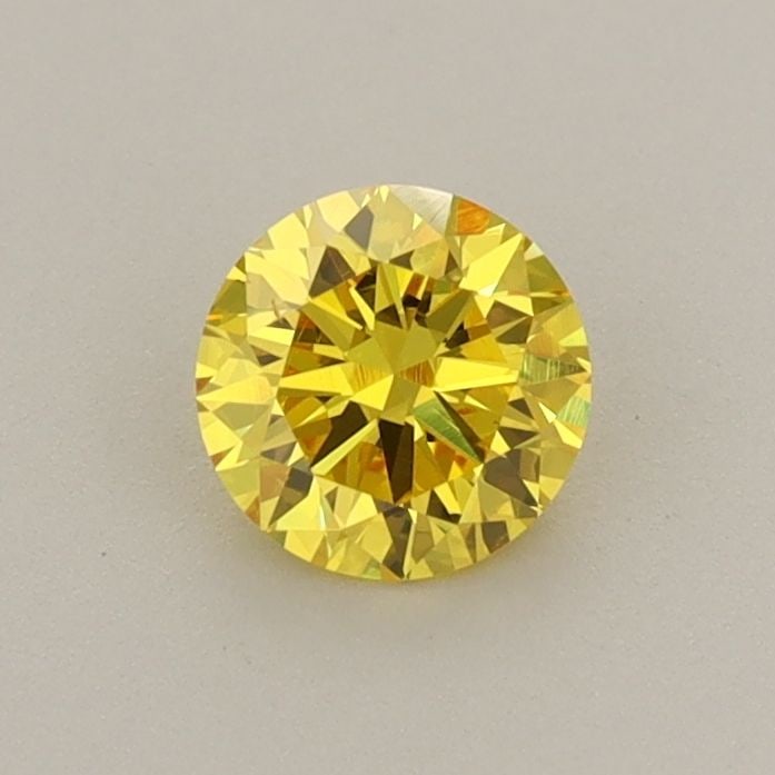 Loose Diamond - ROUND 0.53ct Fancy Vivid Yellow VS2: Loose Diamond - ROUND 0.53ct Fancy Vivid Yellow VS2 Source: This is a real non-mined Diamond that has been grown in a lab Shape: ROUND Carats: 0.53 Color: Fancy Vivid Yellow Certification: IGI Video: