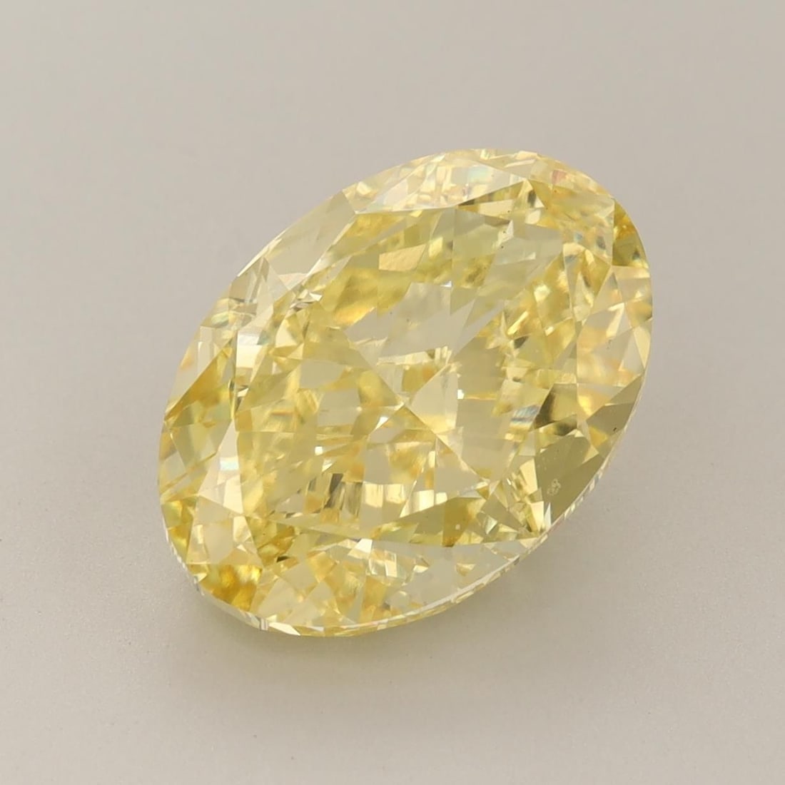 Loose Diamond - OVAL 5.53ct Fancy Vivid Yellow VS1: Loose Diamond - OVAL 5.53ct Fancy Vivid Yellow VS1 Source: This is a real non-mined Diamond that has been grown in a lab Shape: OVAL Carats: 5.53 Color: Fancy Vivid Yellow Certification: IGI Video: