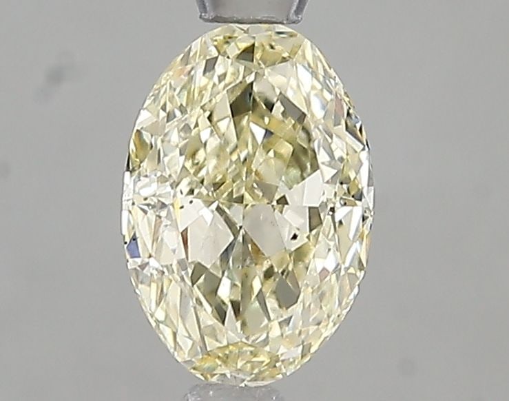 Loose Diamond - OVAL 1.01ct Fancy Light Yellow VS2: Loose Diamond - OVAL 1.01ct Fancy Light Yellow VS2 Source: This is a real non-mined Diamond that has been grown in a lab Shape: OVAL Carats: 1.01 Color: Fancy Light Yellow Certification: IGI Video: