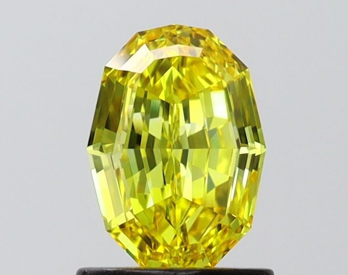 Loose Diamond - OTHER 1.0ct Fancy Vivid Yellow VVS2: Loose Diamond - OTHER 1.0ct Fancy Vivid Yellow VVS2 Source: This is a real non-mined Diamond that has been grown in a lab Shape: OTHER Carats: 1.0 Color: Fancy Vivid Yellow Certification: IGI Video: