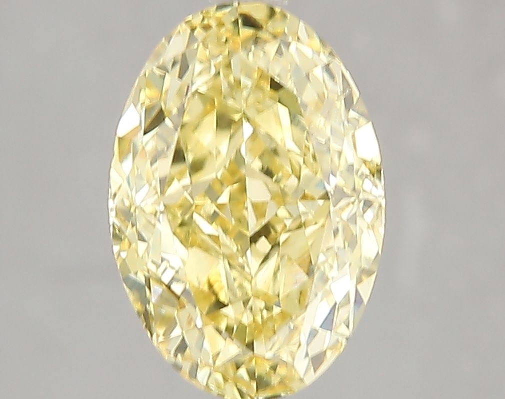 Loose Diamond - OVAL 3.03ct Fancy Intense Yellow VS2: Loose Diamond - OVAL 3.03ct Fancy Intense Yellow VS2 Source: This is a real non-mined Diamond that has been grown in a lab Shape: OVAL Carats: 3.03 Color: Fancy Intense Yellow Certification: IGI Video