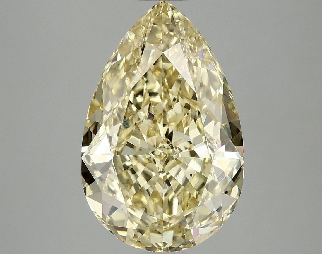 Loose Diamond - PEAR 4.1ct Fancy Vivid Yellow VS2: Loose Diamond - PEAR 4.1ct Fancy Vivid Yellow VS2 Source: This is a real non-mined Diamond that has been grown in a lab Shape: PEAR Carats: 4.1 Color: Fancy Vivid Yellow Certification: IGI Video: