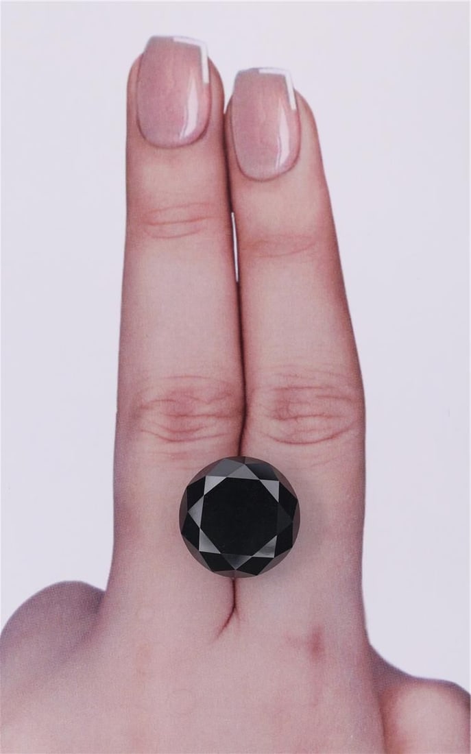 Loose Diamond - ROUND 15.77ct Black: Loose Diamond - ROUND 15.77ct Black Source: Natural Shape: ROUND Carats: 15.77 Color: Black Certification: IGI Video: