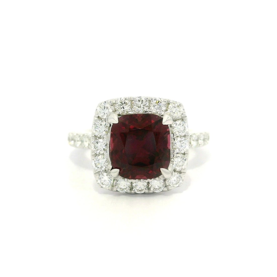GIA Certified 3.24ct Red Spinel Diamond Halo Ring in White Gold: GIA Certified 3.24ct Red Spinel Diamond Halo Ring in White Gold This exquisite cocktail ring features a stunning natural red spinel, cushion cut and prong set, weighing 2.69ct. The spinel is certified