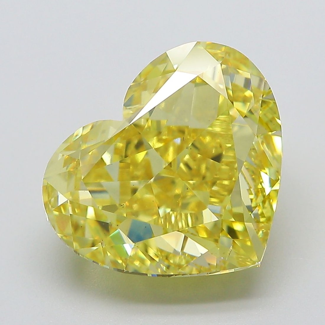Loose Diamond - HEART 8.04ct Fancy Vivid Yellow VS2: Loose Diamond - HEART 8.04ct Fancy Vivid Yellow VS2 Source: This is a real non-mined Diamond that has been grown in a lab Shape: HEART Carats: 8.04 Color: Fancy Vivid Yellow Certification: IGI The Dia
