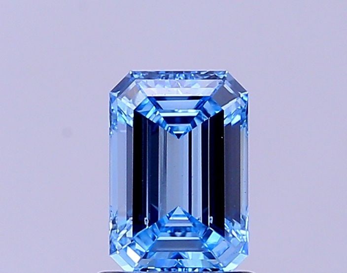Loose Diamond - EMERALD 1.0ct Fancy Vivid Blue VS2: Loose Diamond - EMERALD 1.0ct Fancy Vivid Blue VS2 Source: This is a real non-mined Diamond that has been grown in a lab Shape: EMERALD Carats: 1.0 Color: Fancy Vivid Blue Certification: IGI Video:
