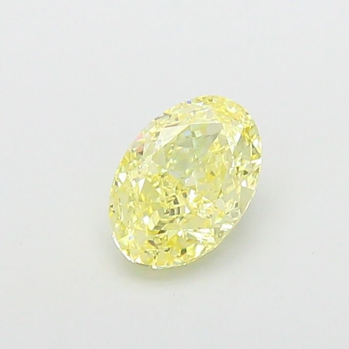 Loose Diamond - OVAL 1.56ct Fancy Light Yellow VVS2: Loose Diamond - OVAL 1.56ct Fancy Light Yellow VVS2 Source: This is a real non-mined Diamond that has been grown in a lab Shape: OVAL Carats: 1.56 Color: Fancy Light Yellow Certification: IGI Video: