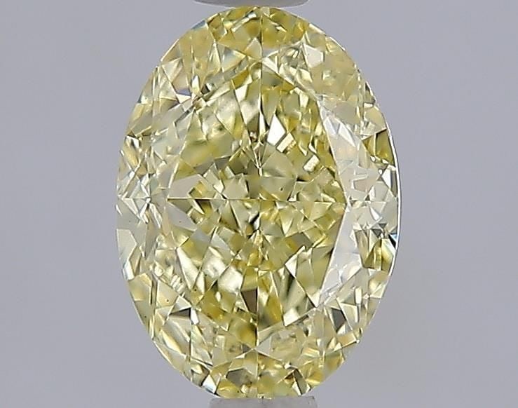 Loose Diamond - OVAL 1.62ct Fancy Yellow VVS2: Loose Diamond - OVAL 1.62ct Fancy Yellow VVS2 Source: This is a real non-mined Diamond that has been grown in a lab Shape: OVAL Carats: 1.62 Color: Fancy Yellow Certification: IGI Video: