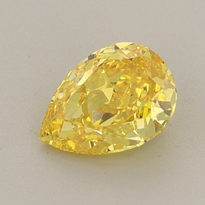 Loose Diamond - PEAR 0.8ct Fancy Vivid Yellow VS1: Loose Diamond - PEAR 0.8ct Fancy Vivid Yellow VS1 Source: This is a real non-mined Diamond that has been grown in a lab Shape: PEAR Carats: 0.8 Color: Fancy Vivid Yellow Certification: IGI Video: