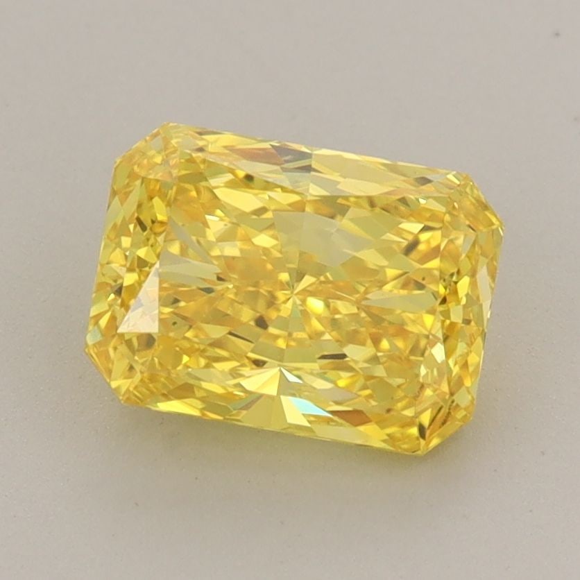 Loose Diamond - RADIANT 1.56ct Fancy Vivid Yellow VS2: Loose Diamond - RADIANT 1.56ct Fancy Vivid Yellow VS2 Source: This is a real non-mined Diamond that has been grown in a lab Shape: RADIANT Carats: 1.56 Color: Fancy Vivid Yellow Certification: IGI The