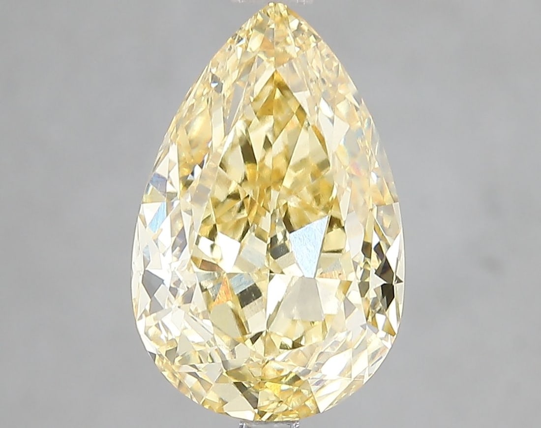 Loose Diamond - PEAR 5.02ct Fancy Vivid Yellow VS1: Loose Diamond - PEAR 5.02ct Fancy Vivid Yellow VS1 Source: This is a real non-mined Diamond that has been grown in a lab Shape: PEAR Carats: 5.02 Color: Fancy Vivid Yellow Certification: IGI Video:
