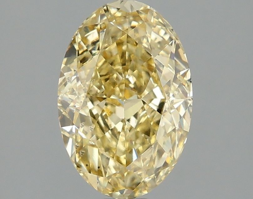 Loose Diamond - OVAL 2.02ct Fancy Intense Yellow VS2: Loose Diamond - OVAL 2.02ct Fancy Intense Yellow VS2 Source: This is a real non-mined Diamond that has been grown in a lab Shape: OVAL Carats: 2.02 Color: Fancy Intense Yellow Certification: IGI Video