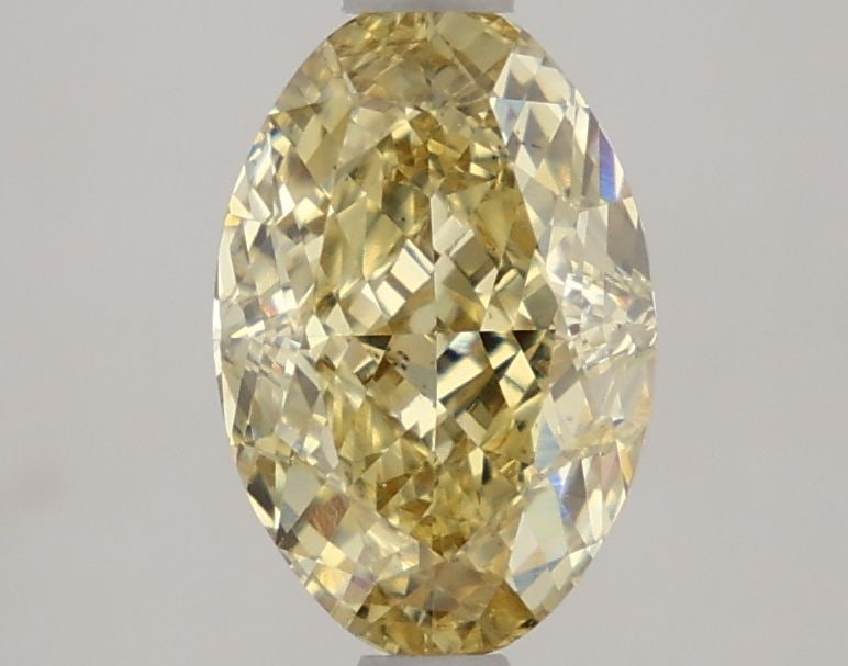 Loose Diamond - OVAL 2.0ct Fancy Vivid Yellow VS2: Loose Diamond - OVAL 2.0ct Fancy Vivid Yellow VS2 Source: This is a real non-mined Diamond that has been grown in a lab Shape: OVAL Carats: 2.0 Color: Fancy Vivid Yellow Certification: NONE The Diamon