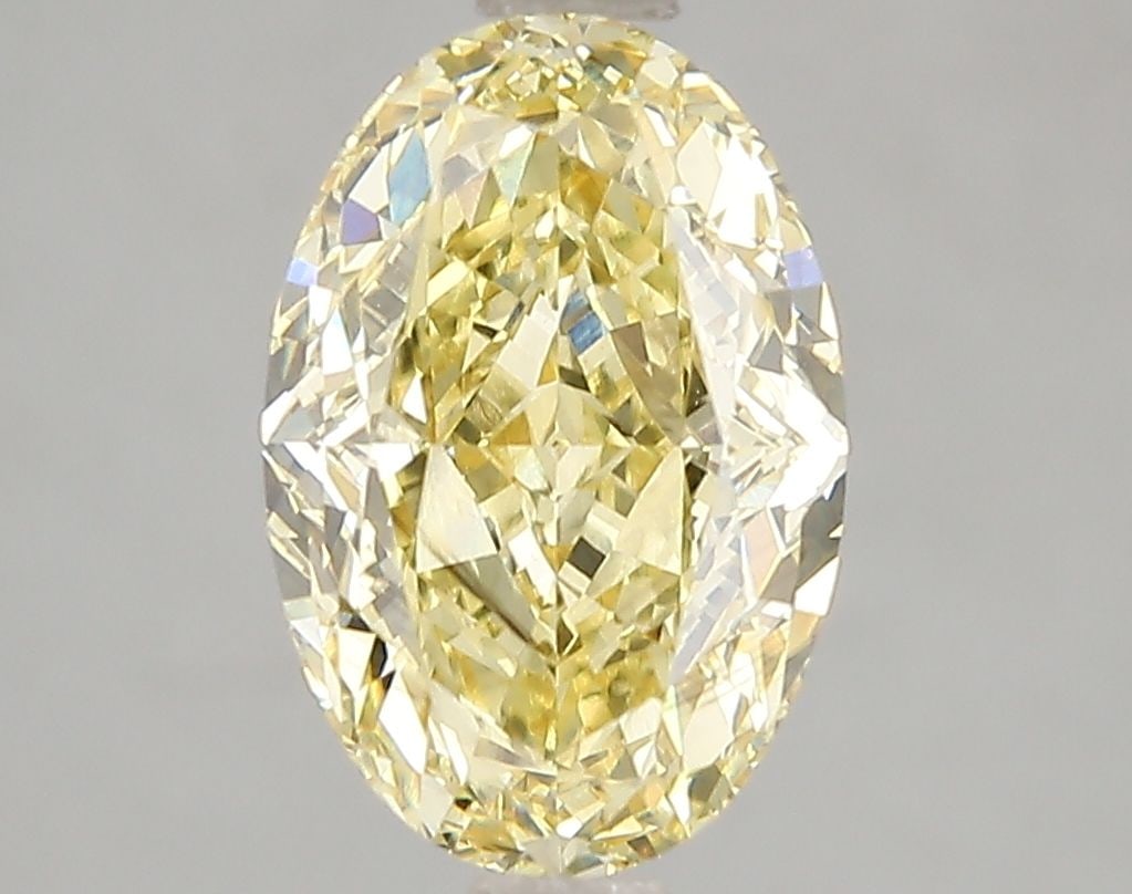Loose Diamond - OVAL 3.07ct Fancy Vivid Yellow SI1: Loose Diamond - OVAL 3.07ct Fancy Vivid Yellow SI1 Source: This is a real non-mined Diamond that has been grown in a lab Shape: OVAL Carats: 3.07 Color: Fancy Vivid Yellow Certification: IGI Video: