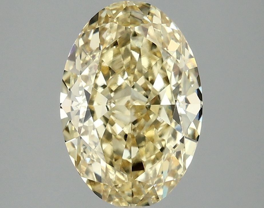 Loose Diamond - OVAL 3.1ct Fancy Intense Yellow VS1: Loose Diamond - OVAL 3.1ct Fancy Intense Yellow VS1 Source: This is a real non-mined Diamond that has been grown in a lab Shape: OVAL Carats: 3.1 Color: Fancy Intense Yellow Certification: IGI Video: