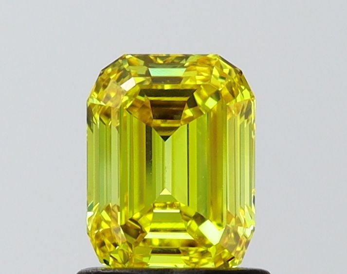 Loose Diamond - EMERALD 1.03ct Fancy Vivid Yellow VVS2: Loose Diamond - EMERALD 1.03ct Fancy Vivid Yellow VVS2 Source: This is a real non-mined Diamond that has been grown in a lab Shape: EMERALD Carats: 1.03 Color: Fancy Vivid Yellow Certification: IGI Vi