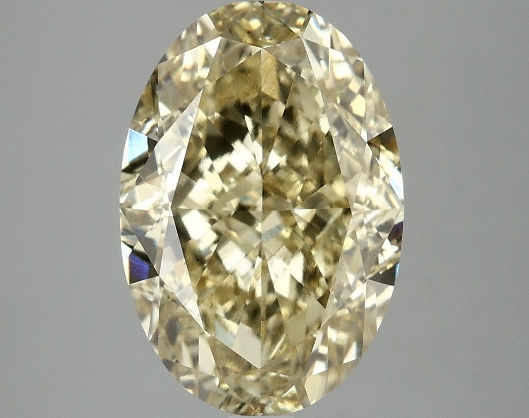 Loose Diamond - OVAL 5.1ct Fancy Vivid Yellow VS2: Loose Diamond - OVAL 5.1ct Fancy Vivid Yellow VS2 Source: This is a real non-mined Diamond that has been grown in a lab Shape: OVAL Carats: 5.1 Color: Fancy Vivid Yellow Certification: IGI Video: