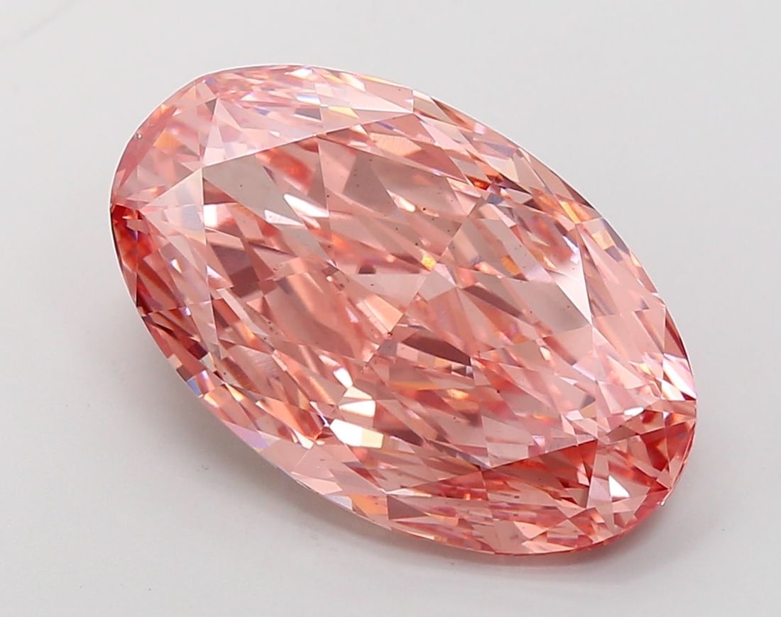 Loose Diamond - OVAL 13.6ct Fancy Vivid Pink VS2: Loose Diamond - OVAL 13.6ct Fancy Vivid Pink VS2 Source: This is a real non-mined Diamond that has been grown in a lab Shape: OVAL Carats: 13.6 Color: Fancy Vivid Pink Certification: IGI Video: