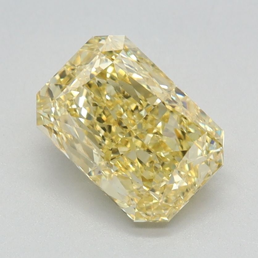 Loose Diamond - RADIANT 1.36ct Fancy Vivid Yellow VS1: Loose Diamond - RADIANT 1.36ct Fancy Vivid Yellow VS1 Source: This is a real non-mined Diamond that has been grown in a lab Shape: RADIANT Carats: 1.36 Color: Fancy Vivid Yellow Certification: IGI Vid