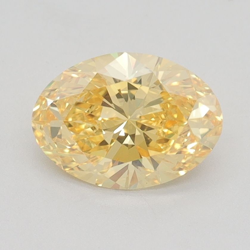 Loose Diamond - OVAL 1.23ct Fancy Vivid Yellow VVS2: Loose Diamond - OVAL 1.23ct Fancy Vivid Yellow VVS2 Source: This is a real non-mined Diamond that has been grown in a lab Shape: OVAL Carats: 1.23 Color: Fancy Vivid Yellow Certification: IGI Video: