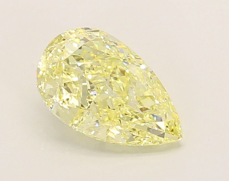 Loose Diamond - PEAR 1.55ct Fancy Yellow VS1: Loose Diamond - PEAR 1.55ct Fancy Yellow VS1 Source: This is a real non-mined Diamond that has been grown in a lab Shape: PEAR Carats: 1.55 Color: Fancy Yellow Certification: IGI Video: