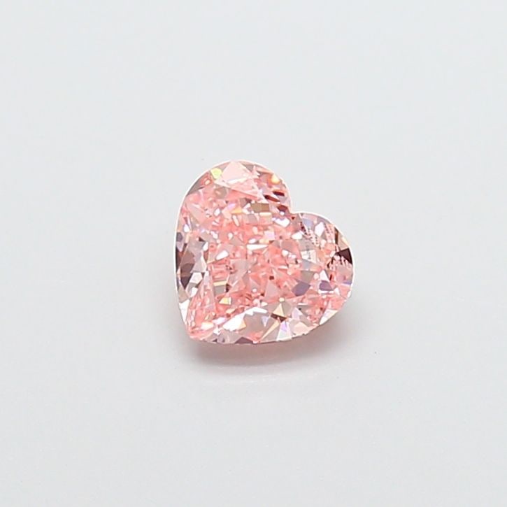 Loose Diamond - HEART 0.88ct Fancy Vivid Pink VS1: Loose Diamond - HEART 0.88ct Fancy Vivid Pink VS1 Source: This is a real non-mined Diamond that has been grown in a lab Shape: HEART Carats: 0.88 Color: Fancy Vivid Pink Certification: IGI Video: