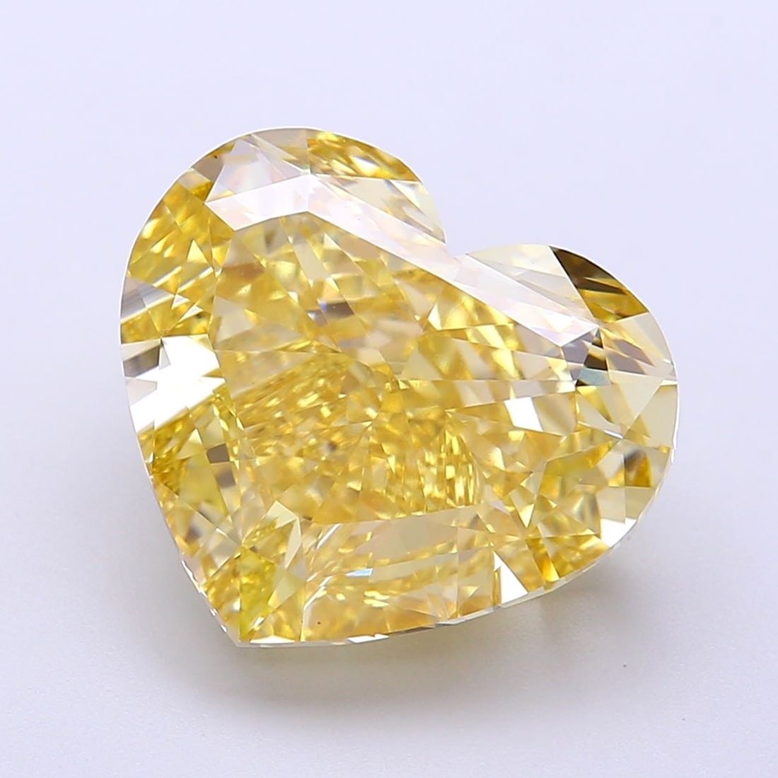Loose Diamond - HEART 10.02ct Fancy Intense Yellow VS1: Loose Diamond - HEART 10.02ct Fancy Intense Yellow VS1 Source: This is a real non-mined Diamond that has been grown in a lab Shape: HEART Carats: 10.02 Color: Fancy Intense Yellow Certification: IGI V