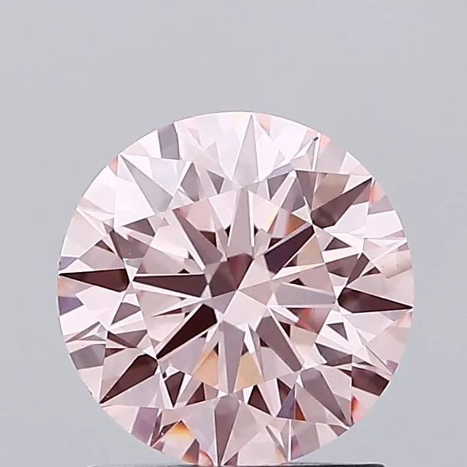 Ideal Loose Diamond - ROUND 1.34ct Fancy Vivid Pink VS1: Ideal Loose Diamond - ROUND 1.34ct Fancy Vivid Pink VS1 Source: This is a real non-mined Diamond that has been grown in a lab Shape: ROUND Carats: 1.34 Color: Fancy Vivid Pink Certification: IGI Video